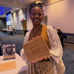a woman holding a cutting board